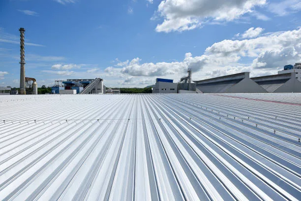 Light-colored profiled metal roof on a commercial building